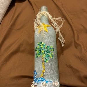 It is hand made and it is glass